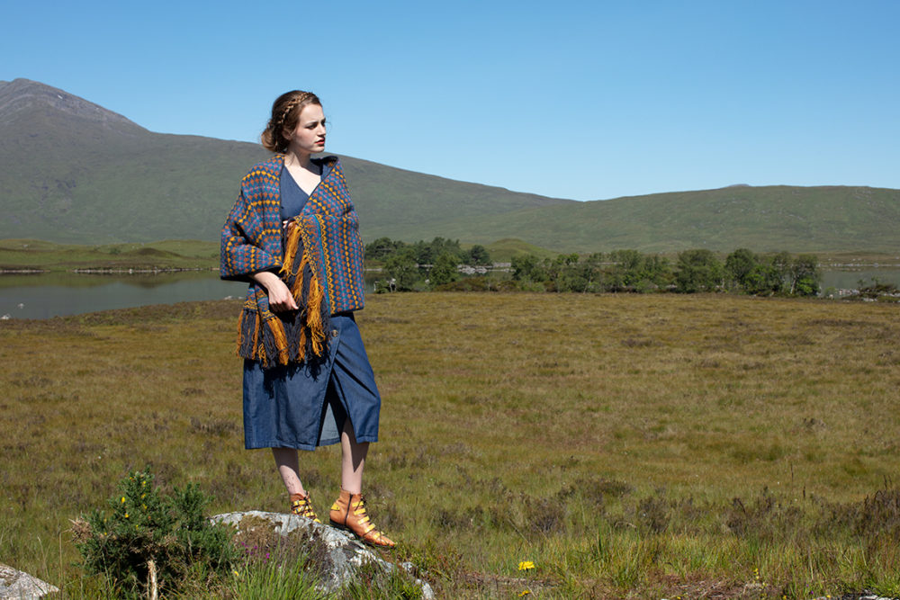 Gypsy Moth Wrap hand knitwear design in blue colourway from the book A Collector's Item by Jade Starmore
