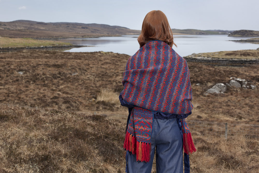 Suzani Wrap hand knitwear design in blue colourway from the book A Collector's Item by Jade Starmore