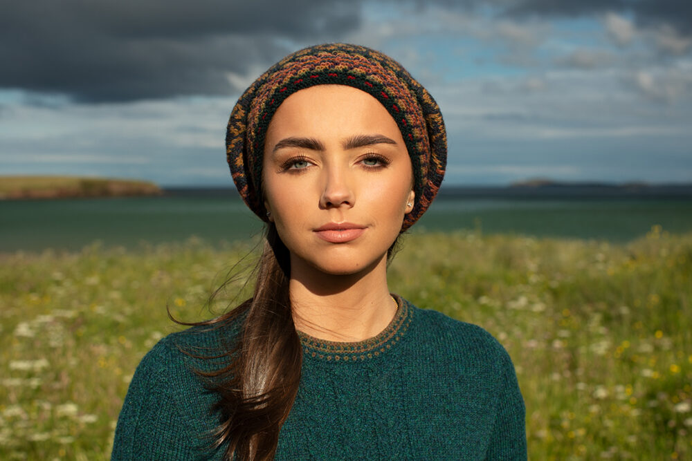 The Lapwing Pullover and Red Jacobite Rose Hat Set patterncard kit designs by Alice Starmore in Hebridean 2 Ply