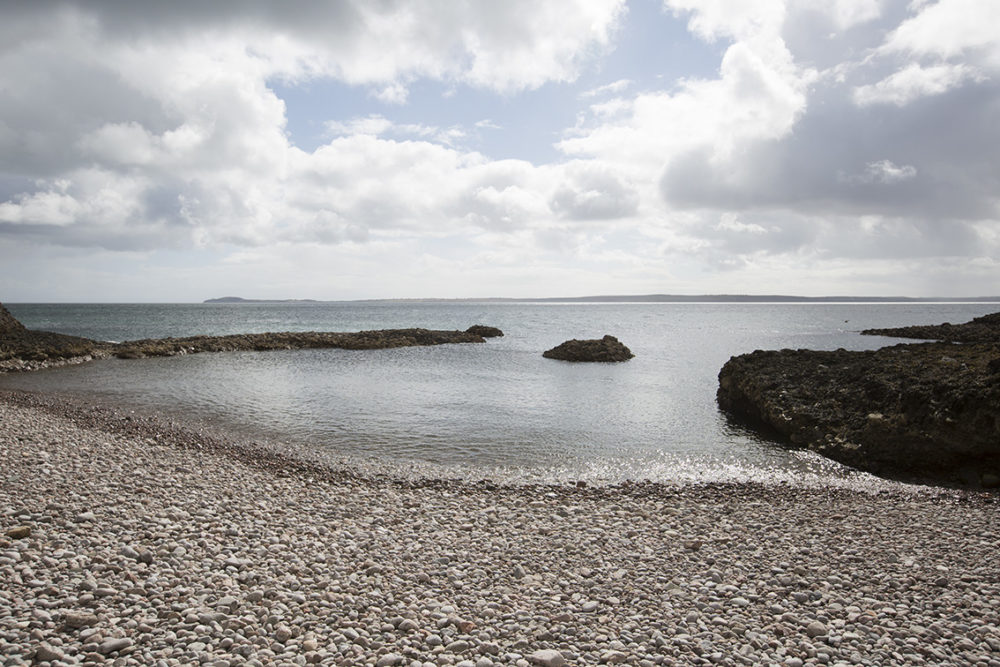 A shingle beach on the East of the island
