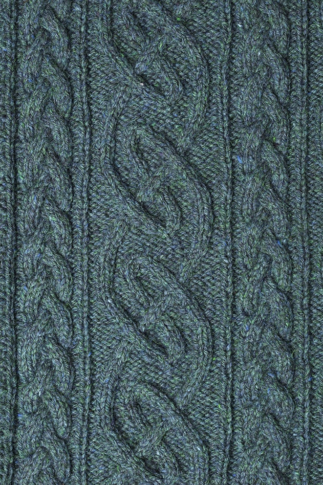 Detail of the St Brigid knitwear design from Aran Knitting by Alice Starmore in pure wool Hebridean 3 Ply hand knitting yarn