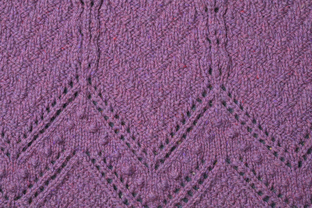Detail of the Secret Garden knitwear design from The Children's Collection by Alice Starmore in pure wool Hebridean 3 Ply hand knitting yarn
