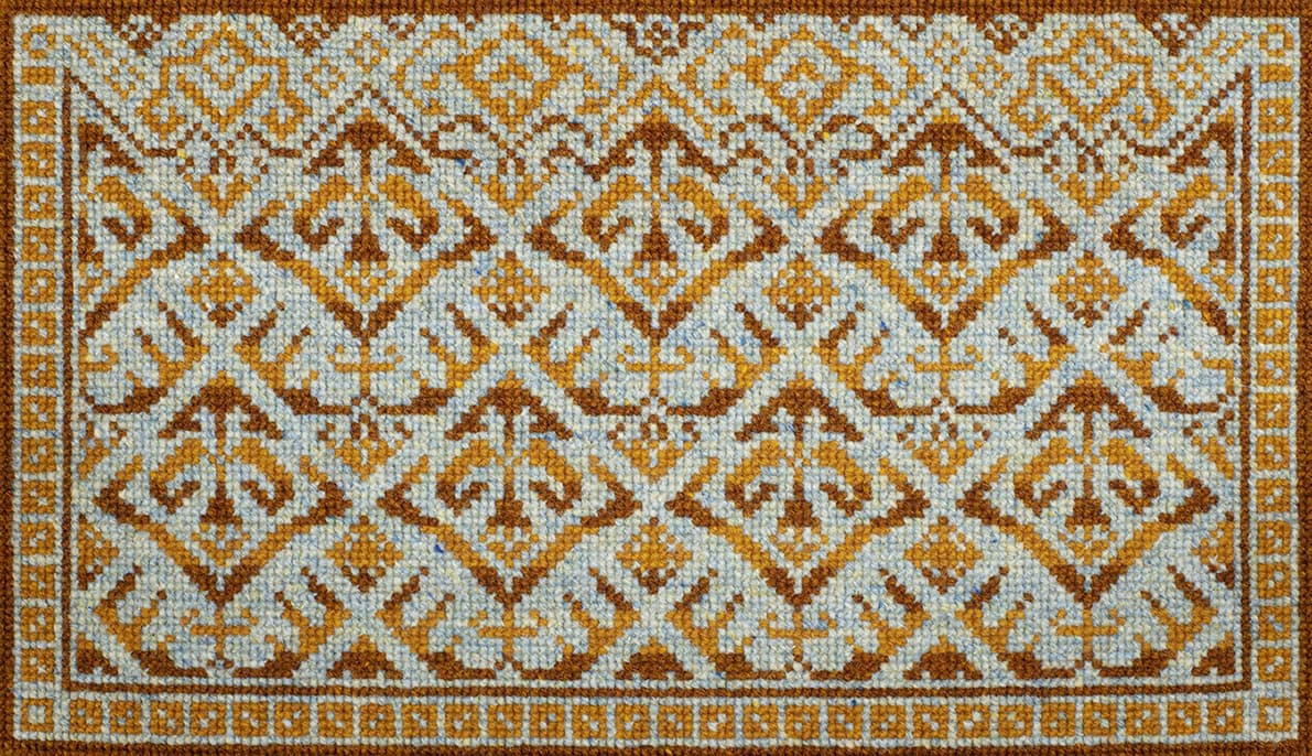 Needlepoint design by Jade Starmore worked in Hebridean 2 Ply hand-knitting yarn