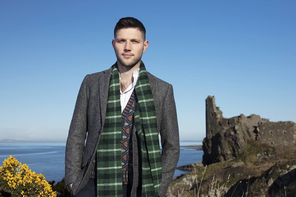 Musician Colm Keegan wearing the Rosemarkie waistcoat and a woven scarf by Alice Starmore Musician Colm Keegan wearing the Rosemarkie waistcoat and a woven scarf by Alice Starmore