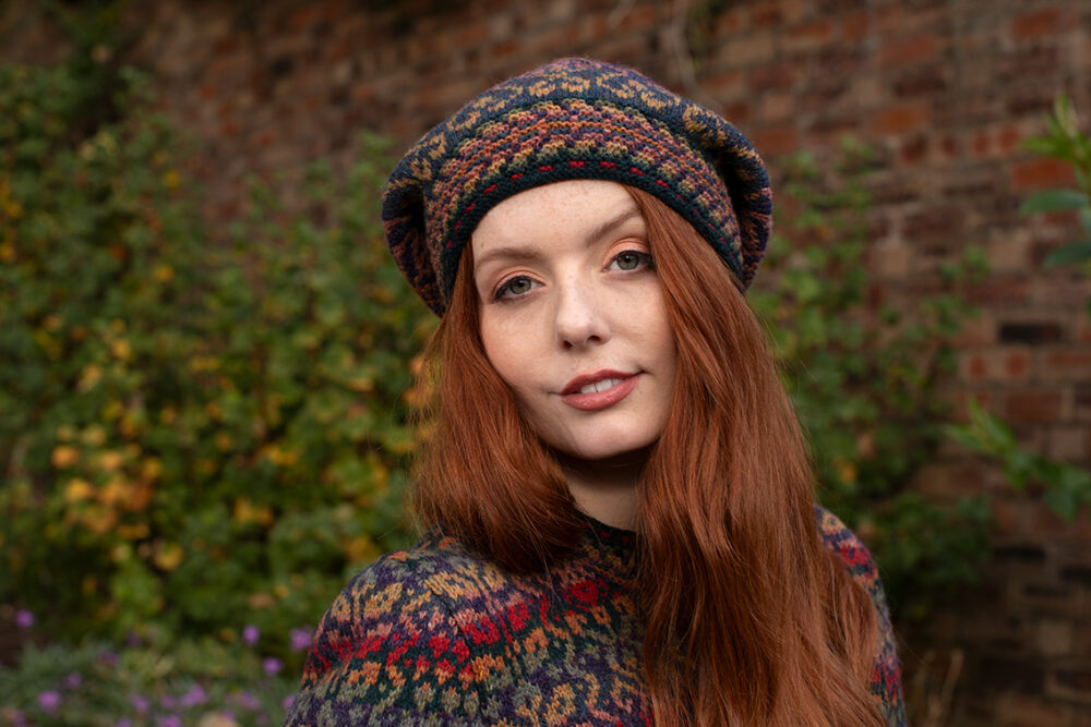 The Red Jacobite Rose Cardgian and Hat Set patterncard kit designs by Alice Starmore in Hebridean 2 Ply