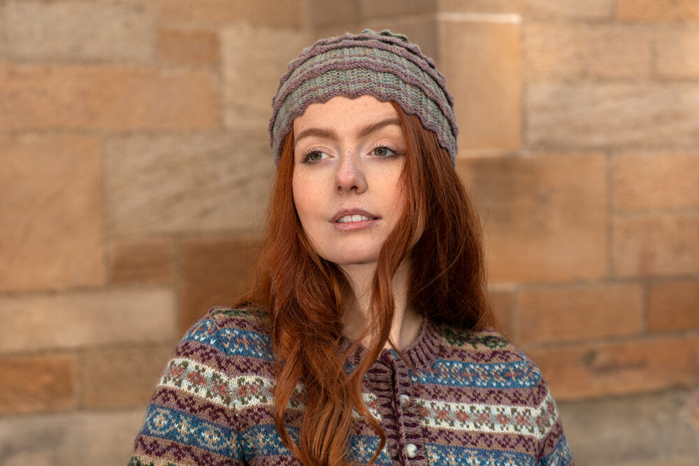 Levenish Hat, Herald fingerless gloves and Peigi Cardigan patterncard kits and Mo Chridhe Blanket from the Infinite Cable Class, all designs by Alice Starmore
