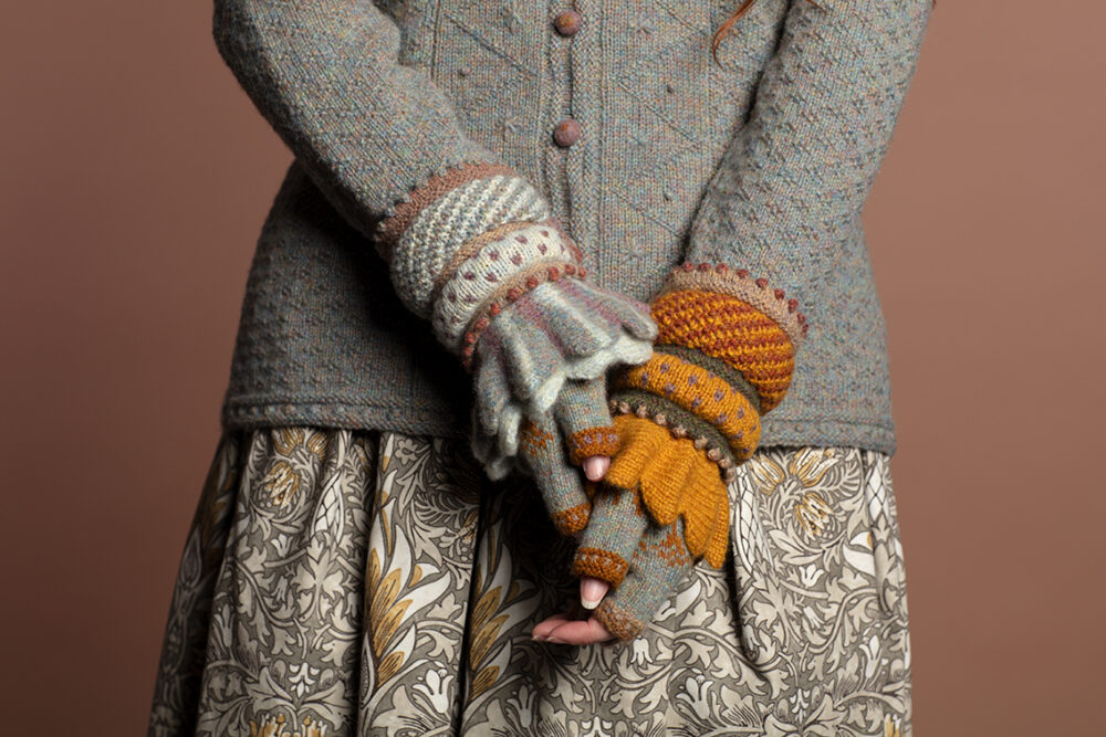 The Mountain Hare Jacket from the book Glamourie, the Mo Chridhe Blanket from the Infinite Cable Class and Dun Cuffs from Creative Course 2.
