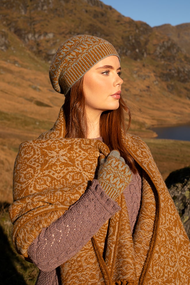 Persian Tiles wrap by Jade Starmore from the book A Collector's Item and Hirta Hat Set and Maidenhair pullover patterncard kits by Alice Starmore