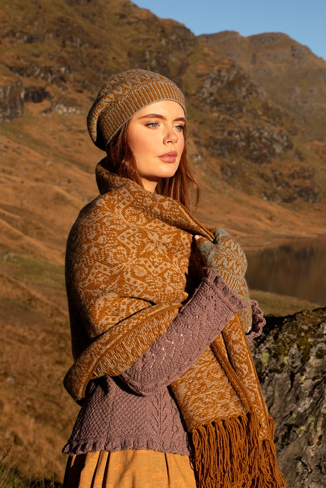 Persian Tiles wrap by Jade Starmore from the book A Collector's Item and Hirta Hat Set and Maidenhair pullover patterncard kits by Alice Starmore