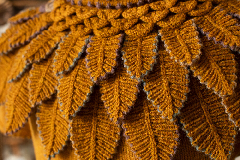 The Eagle Collar Patterncard Kit design by Alice Starmore for Virtual Yarns, shown in Whin Hebridean 2 Ply