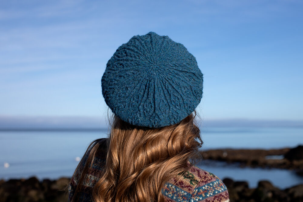 The Peigi Cardigan and Ruabhal Hat Set patterncard kit designs by Alice Starmore in Hebridean 2 Ply