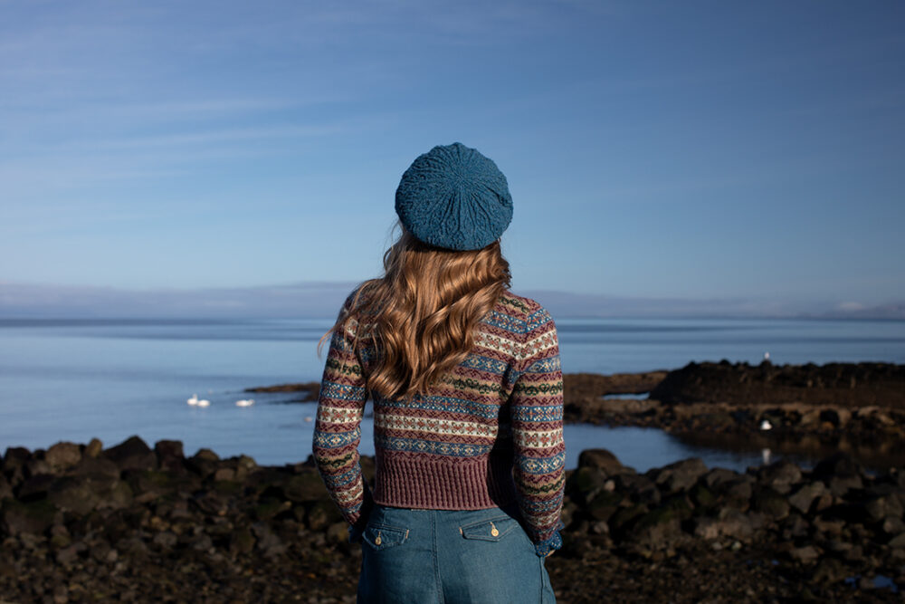 The Peigi Cardigan and Ruabhal Hat Set patterncard kit designs by Alice Starmore in Hebridean 2 Ply