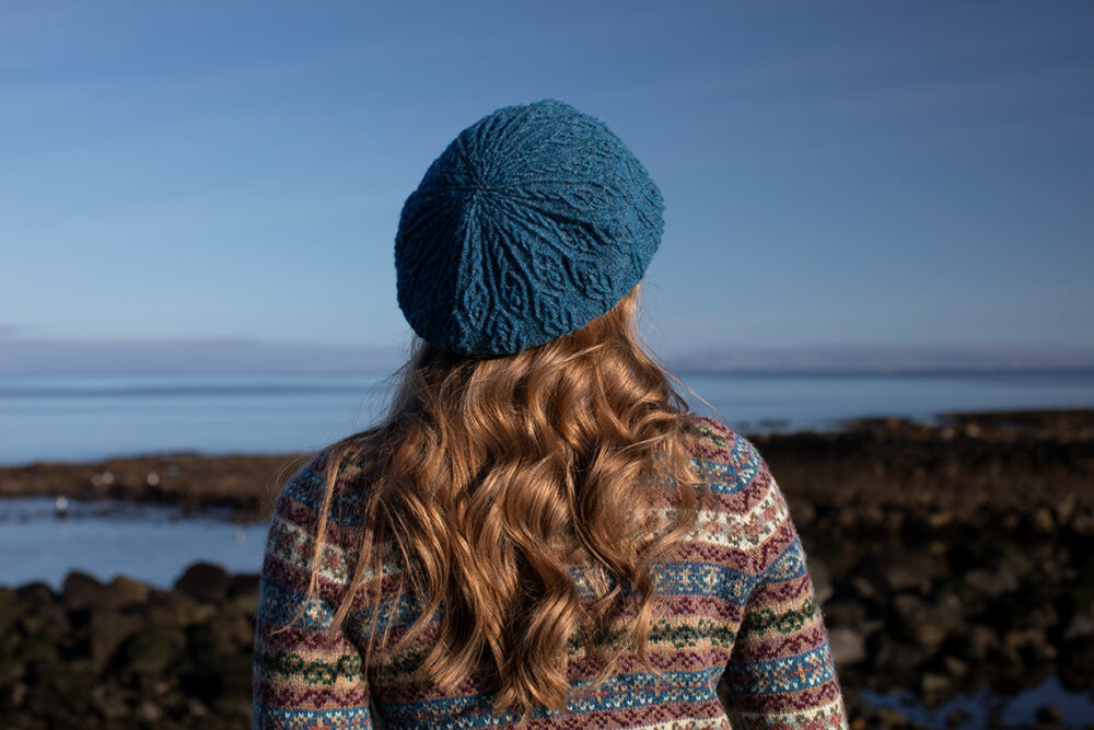 The Peigi Cardigan and Ruabhal Hat Set patterncard kit designs by Alice Starmore in Hebridean 2 Ply