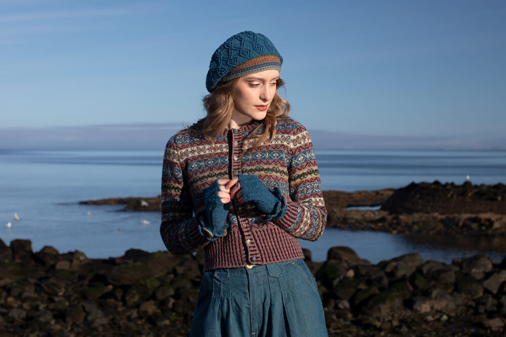 The Peigi Cardigan and Ruabhal Hat Set patterncard kit designs by Alice Starmore in Hebridean 2 Ply