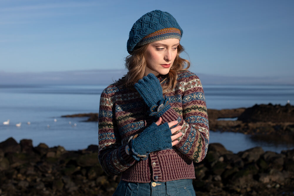 The Peigi Cardigan and Ruabhal Hat Set patterncard kit designs by Alice Starmore in Hebridean 2 Ply