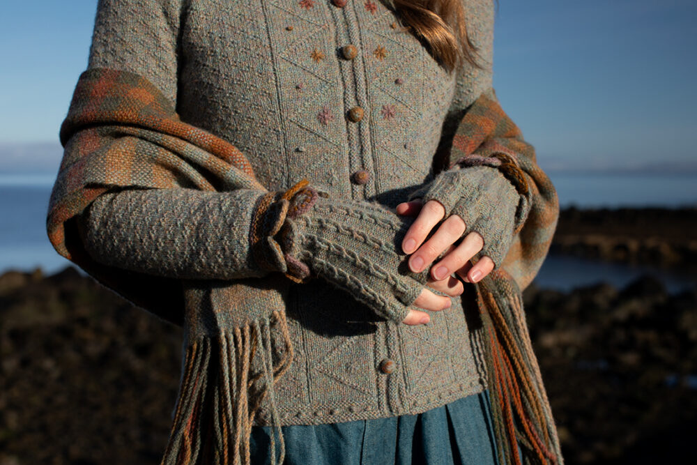 The Ruabhal Hat Set and Oiseabhal patterncard kit designs and Mountain Hare Cardigan from Glamourie by Alice Starmore in Hebridean 2 Ply