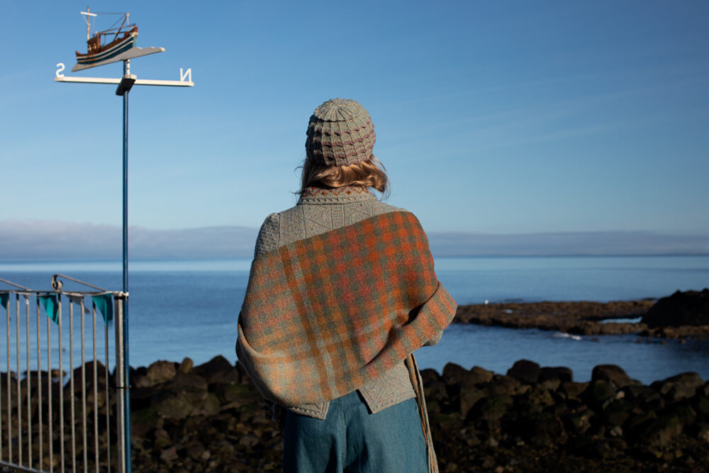 The Ruabhal gloves, Levenish Hat and Oiseabhal patterncard kit designs and Mountain Hare Cardigan from Glamourie by Alice Starmore in Hebridean 2 Ply