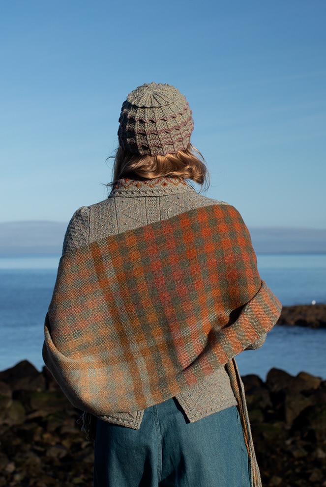 The Ruabhal gloves, Levenish Hat and Oiseabhal patterncard kit designs and Mountain Hare Cardigan from Glamourie by Alice Starmore in Hebridean 2 Ply