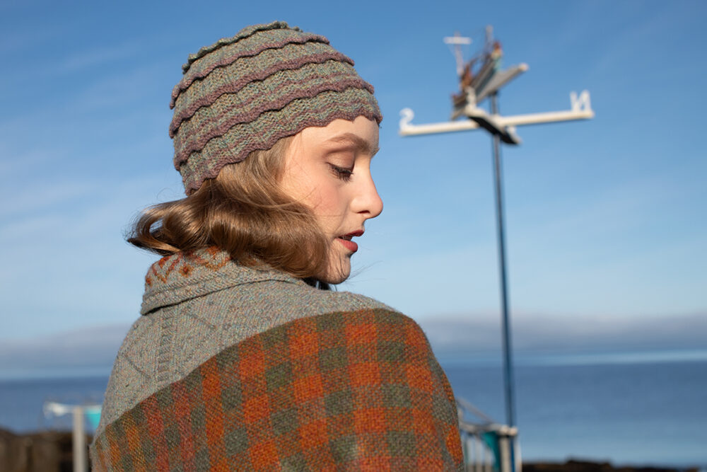 The Ruabhal gloves, Levenish Hat and Oiseabhal patterncard kit designs and Mountain Hare Cardigan from Glamourie by Alice Starmore in Hebridean 2 Ply