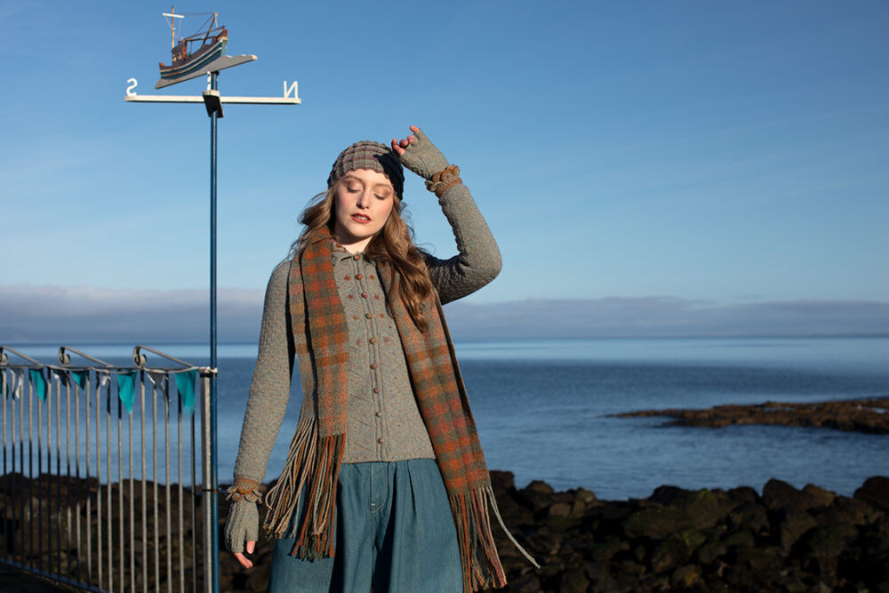 The Ruabhal gloves, Levenish Hat and Oiseabhal patterncard kit designs and Mountain Hare Cardigan from Glamourie by Alice Starmore in Hebridean 2 Ply