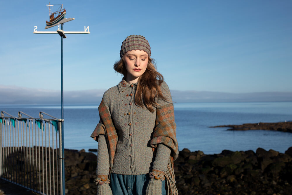 The Ruabhal gloves, Levenish Hat and Oiseabhal patterncard kit designs and Mountain Hare Cardigan from Glamourie by Alice Starmore in Hebridean 2 Ply