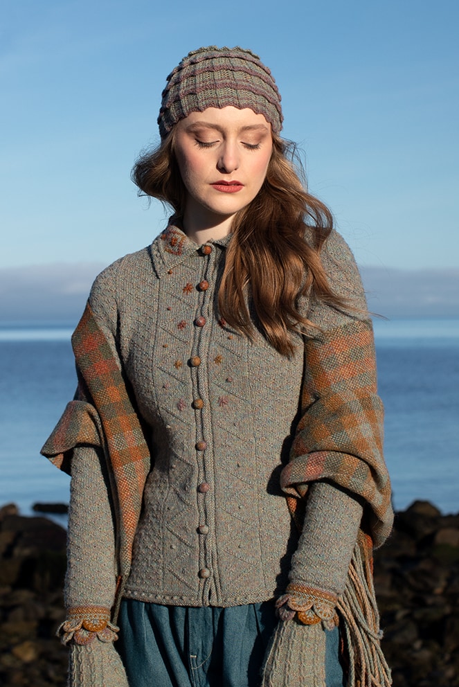 The Ruabhal gloves, Levenish Hat and Oiseabhal patterncard kit designs and Mountain Hare Cardigan from Glamourie by Alice Starmore in Hebridean 2 Ply