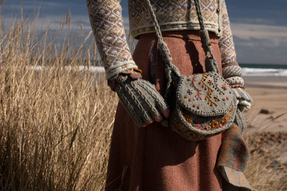 The Delta Cardigan, Ruabhal Hat Set and Oiseabhal patterncard kit designs and Dun Cuff from Creative Course 2 and Sporran Bag from Creative Course 3 by Alice Starmore in Hebridean 2 Ply