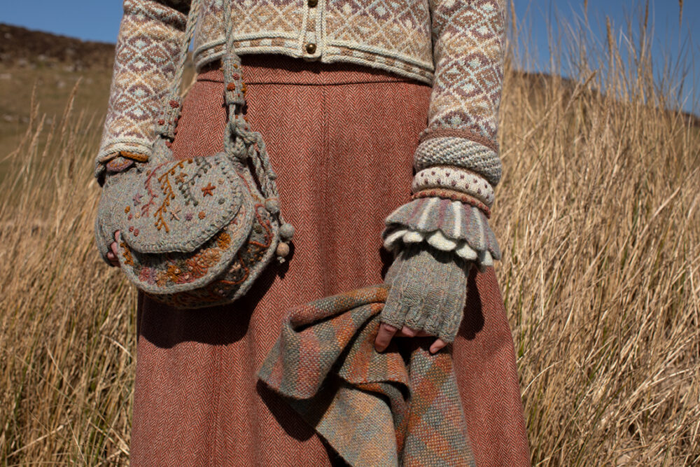 The Delta Cardigan, Ruabhal Hat Set and Oiseabhal patterncard kit designs and Dun Cuff from Creative Course 2 and Sporran Bag from Creative Course 3 by Alice Starmore in Hebridean 2 Ply