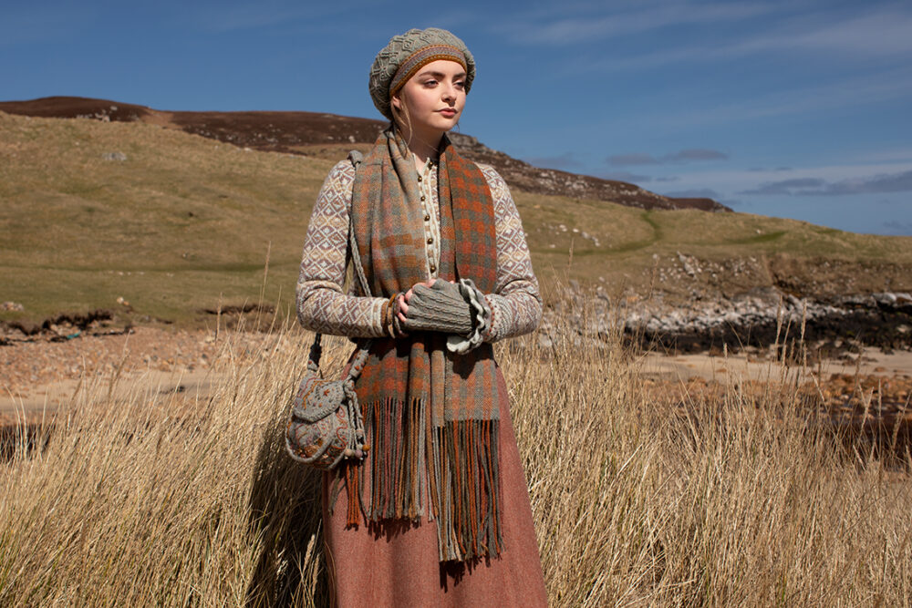 The Delta Cardigan, Ruabhal Hat Set and Oiseabhal patterncard kit designs and Dun Cuff from Creative Course 2 and Sporran Bag from Creative Course 3 by Alice Starmore in Hebridean 2 Ply