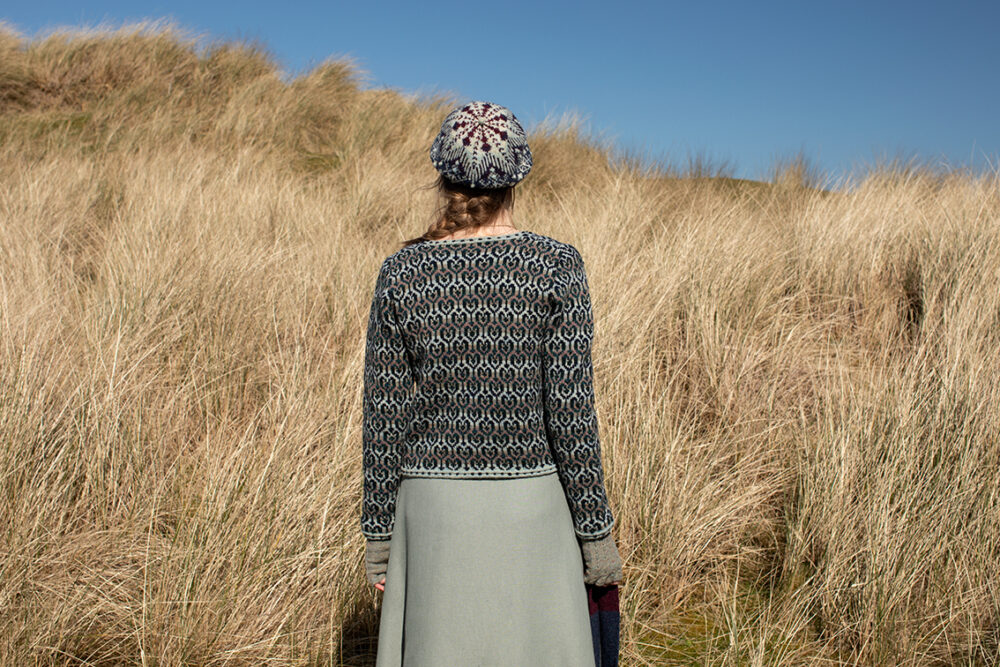 The Loch Lomond cardigan, St Agnes Eve Beret and Scarf and Ruabhal gloves hand knitwear patterncard kit designs by Alice Starmore made in Hebridean 2 Ply