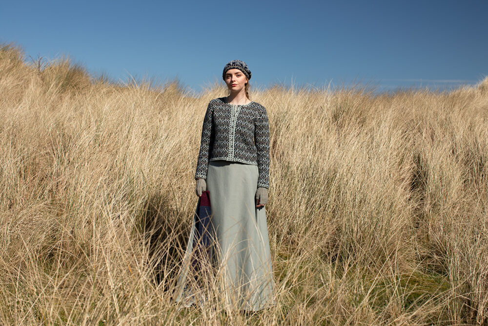 The Loch Lomond cardigan, St Agnes Eve Beret and Scarf and Ruabhal gloves hand knitwear patterncard kit designs by Alice Starmore made in Hebridean 2 Ply