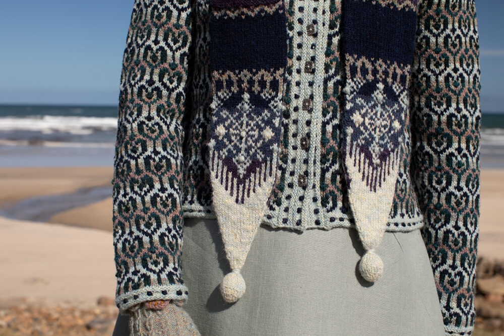 The Loch Lomond cardigan, St Agnes Eve Beret and Scarf and Ruabhal gloves hand knitwear patterncard kit designs by Alice Starmore made in Hebridean 2 Ply