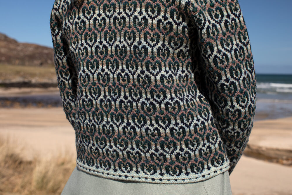 The Loch Lomond cardigan, St Agnes Eve Beret and Scarf and Ruabhal gloves hand knitwear patterncard kit designs by Alice Starmore made in Hebridean 2 Ply