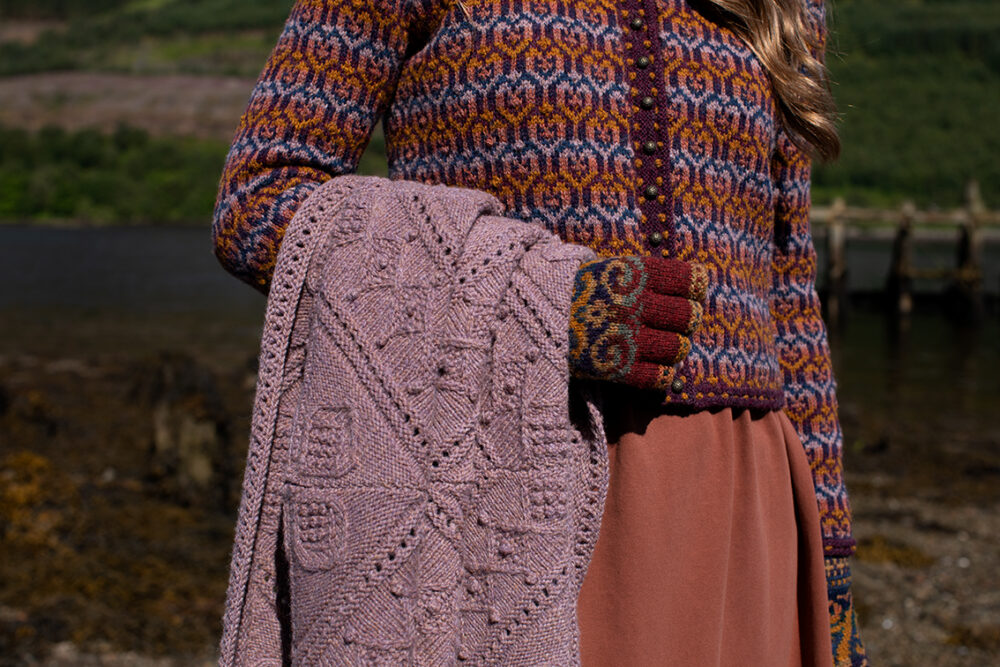 The Loch Lomond Cardigan by Jade Starmore and the Henry VIII Hat Set by Alice Starmore, hand knitwear design patterncard kits in Hebridean 2 Ply and the Mo Chridhe Blanket from the Infinite Cable Class in Hebridean 3 Ply