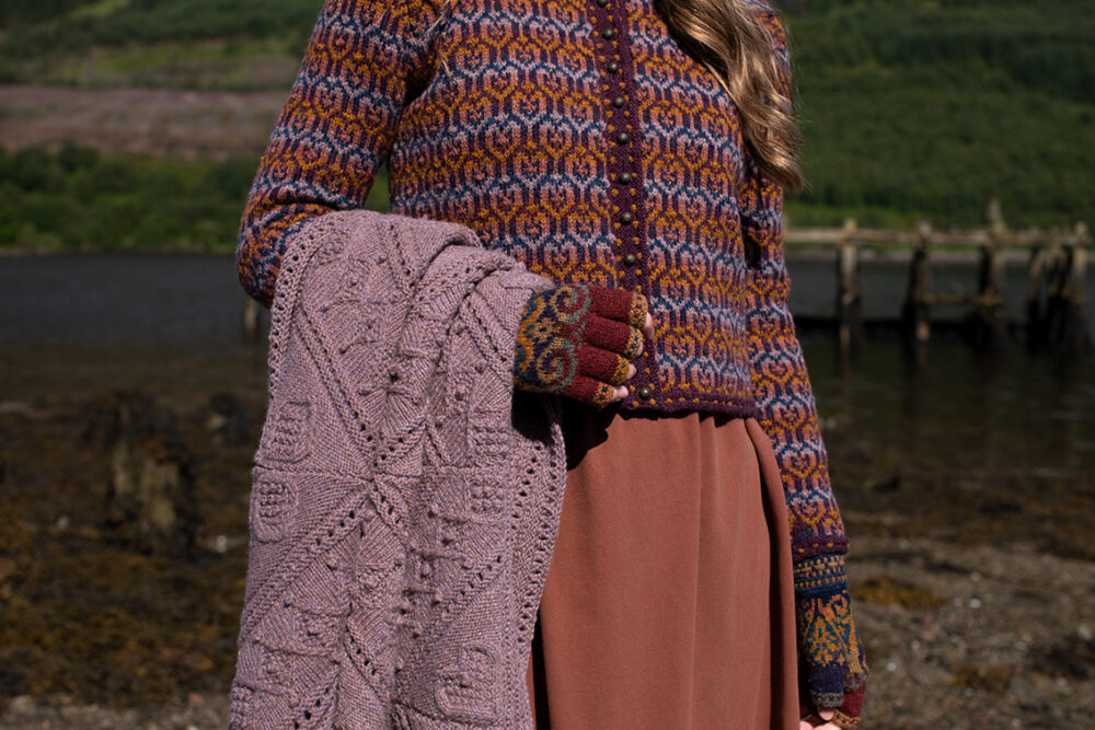 The Loch Lomond Cardigan by Jade Starmore and the Henry VIII Hat Set by Alice Starmore, hand knitwear design patterncard kits in Hebridean 2 Ply and the Mo Chridhe Blanket from the Infinite Cable Class in Hebridean 3 Ply