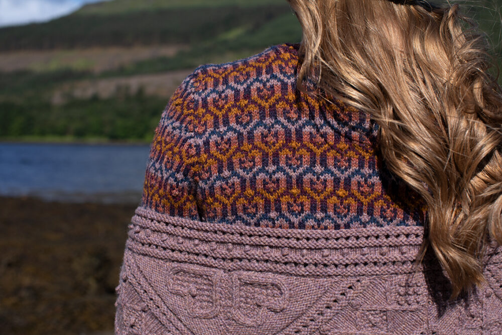 The Loch Lomond Cardigan by Jade Starmore and the Henry VIII Hat Set by Alice Starmore, hand knitwear design patterncard kits in Hebridean 2 Ply and the Mo Chridhe Blanket from the Infinite Cable Class in Hebridean 3 Ply