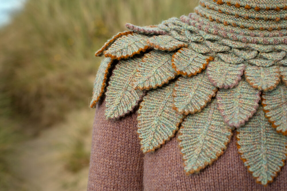 The Levenish Hat, Eagle Collar and Herald patterncard kit designs by Alice Starmore in Hebridean 2 Ply and the Mol Eire pullover patterncard kit design by Jade Starmore in Hebridean 2 & 3 Ply