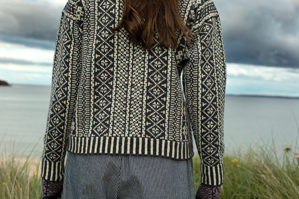 The Faroe pullover, Hat Trick Hat and Hirta Gloves patterncard kit designs by Alice Starmore in Hebridean 2 Ply