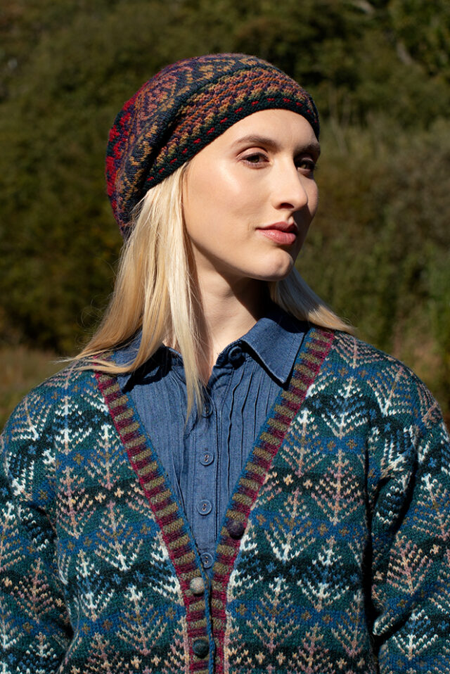 The Oregon Spring Cardigan and Red Jacobite Rose Hat Set patterncard kit designs by Alice Starmore in Hebridean 2 Ply