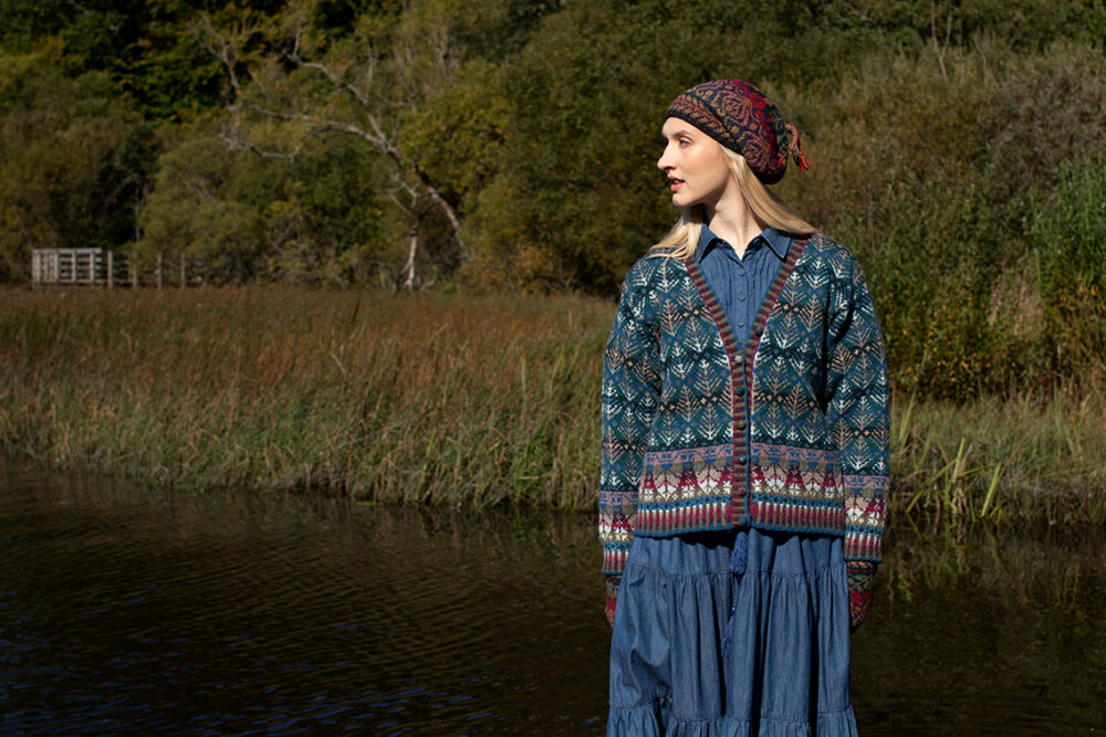 The Oregon Spring Cardigan and Red Jacobite Rose Hat Set patterncard kit designs by Alice Starmore in Hebridean 2 Ply