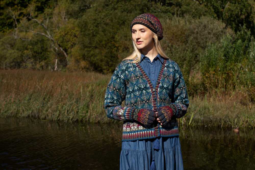 The Oregon Spring Cardigan and Red Jacobite Rose Hat Set patterncard kit designs by Alice Starmore in Hebridean 2 Ply