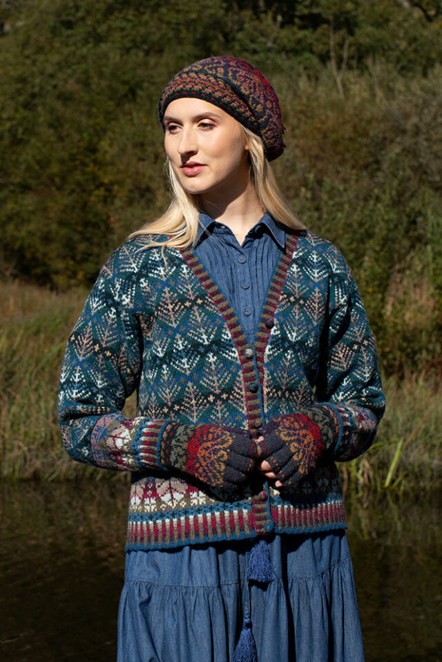 The Oregon Spring Cardigan and Red Jacobite Rose Hat Set patterncard kit designs by Alice Starmore in Hebridean 2 Ply