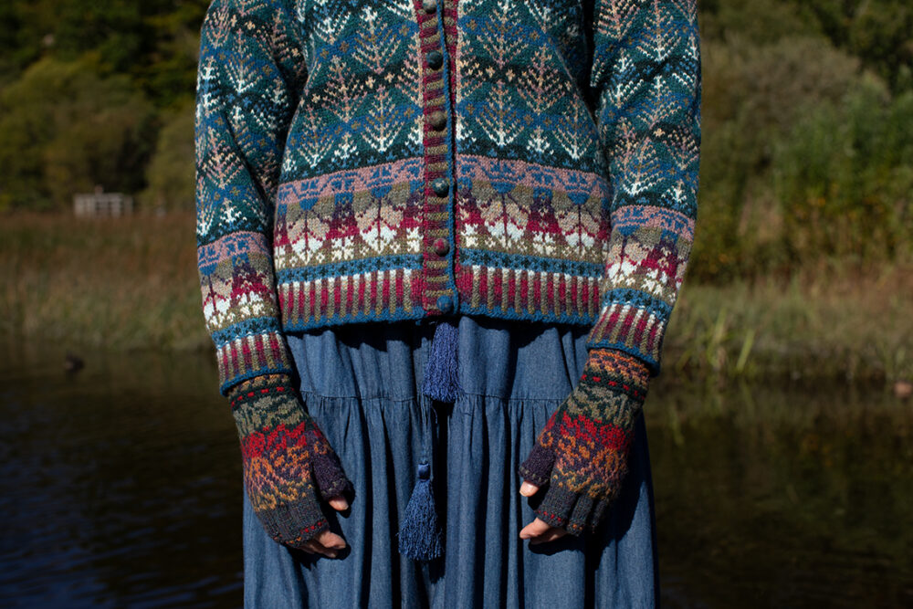 The Oregon Spring Cardigan and Red Jacobite Rose Hat Set patterncard kit designs by Alice Starmore in Hebridean 2 Ply