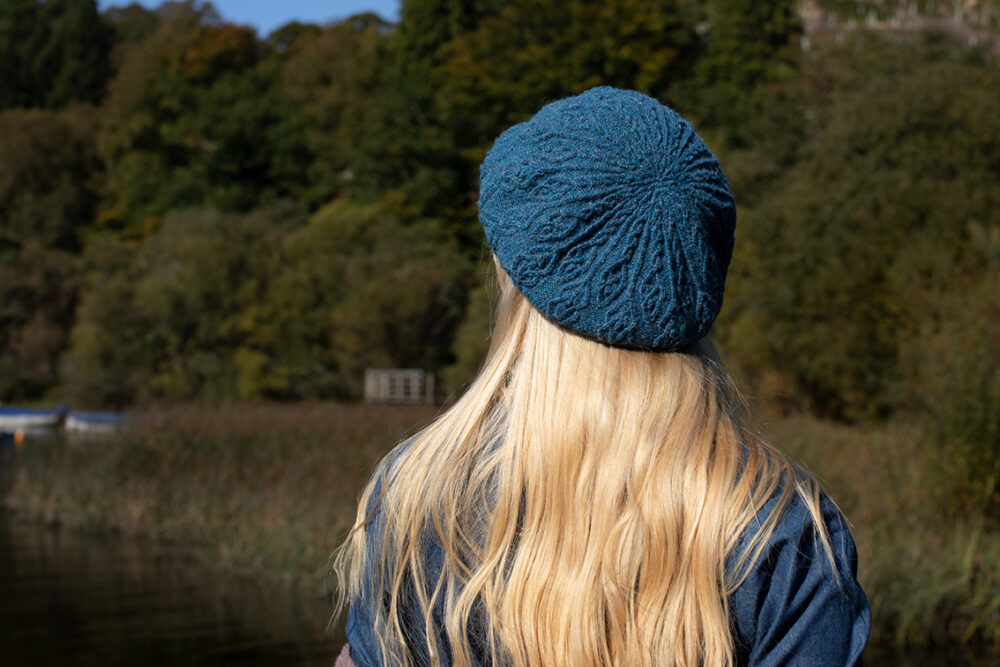 The Ruabhal Hat Set patterncard kit design by Alice Starmore in Hebridean 2 Ply and the Mo Chridhe blanket from the Infinite Cable Class in Hebridean 3 Ply