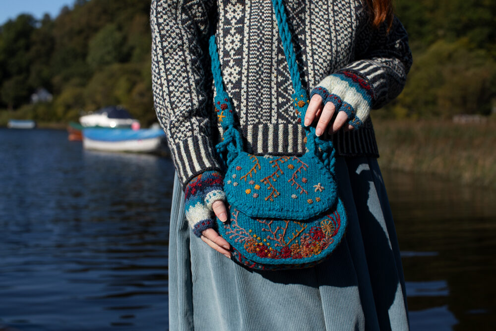 The Faroe pullover and Wave Hat Set patterncard kit designs and the Sporran bag design from Creative Course 3, all by Alice Starmore in Hebridean 2 Ply