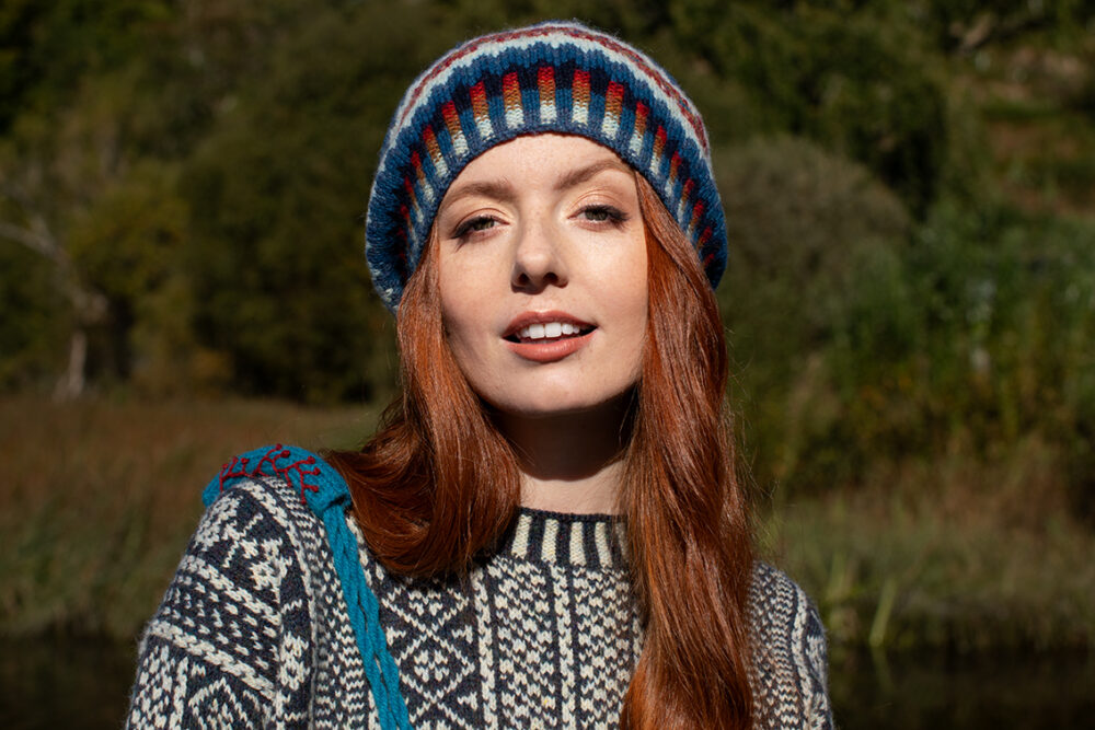 The Faroe pullover and Wave Hat Set patterncard kit designs and the Sporran bag design from Creative Course 3, all by Alice Starmore in Hebridean 2 Ply