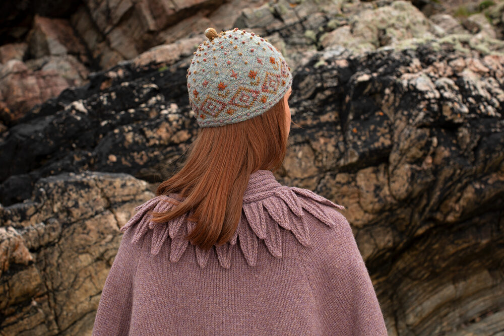 The Raven Poncho, Mountain Hare Hat and Hirta glvoes patterncard kit designs by Alice Starmore in Hebridean 2 & 3 Ply