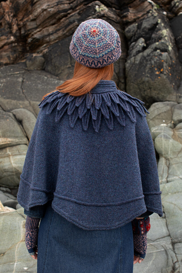 The Raven Poncho and Hirta Hat Set patterncard kit designs by Alice Starmore in Hebridean 2 & 3 Ply and a cuff from Creative Course 2