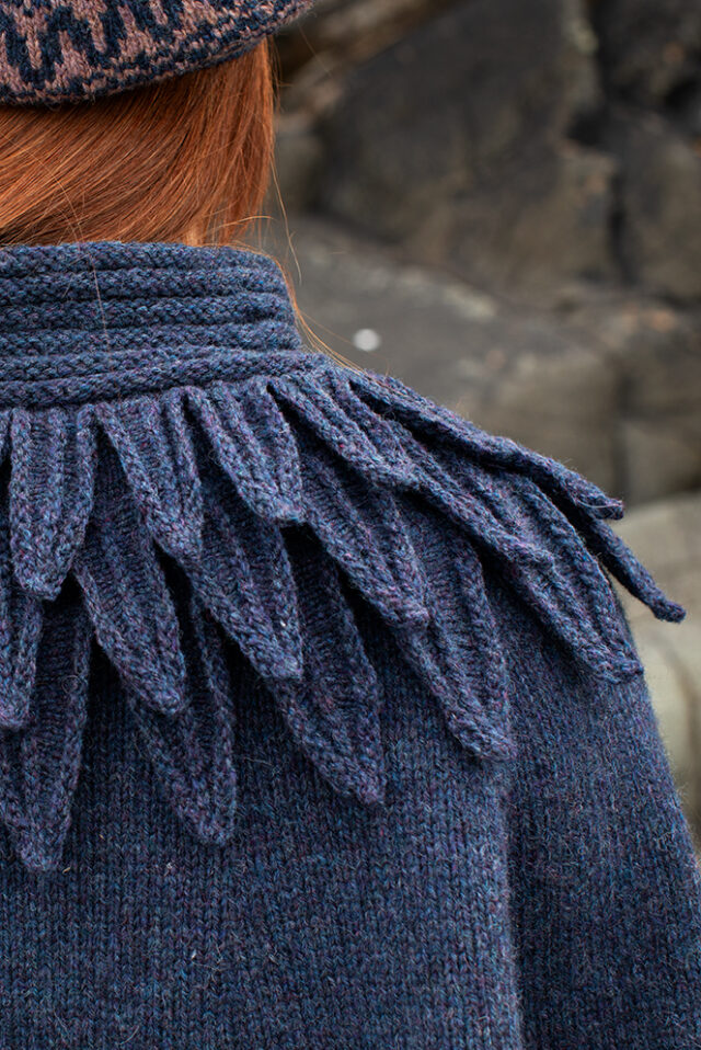 The Raven Poncho and Hirta Hat Set patterncard kit designs by Alice Starmore in Hebridean 2 & 3 Ply and a cuff from Creative Course 2