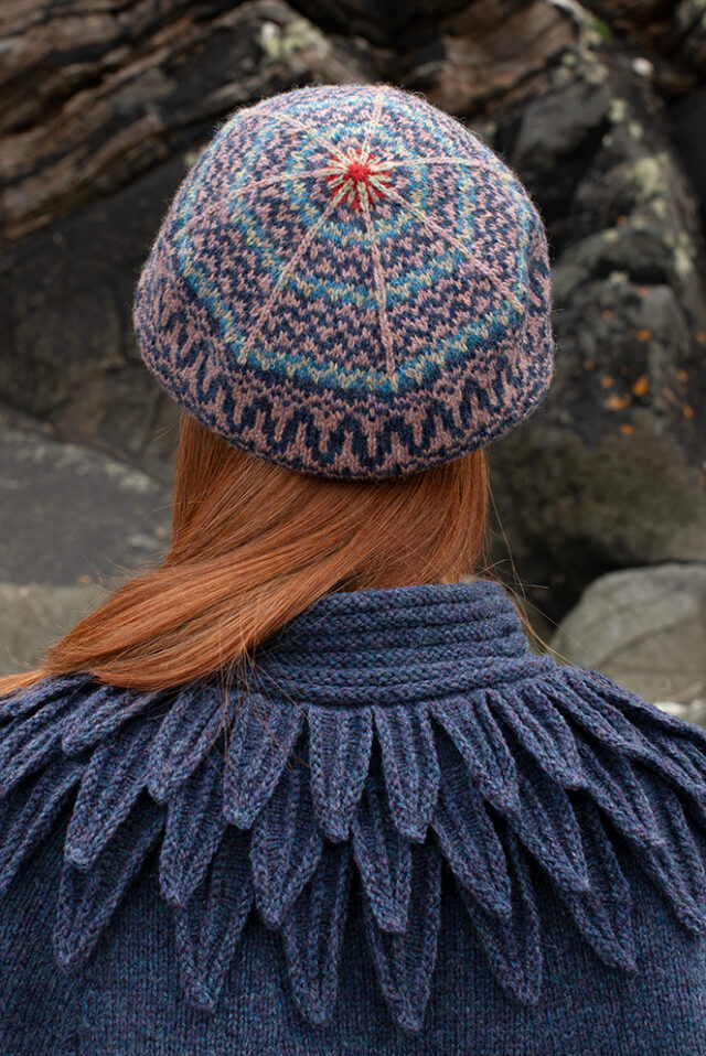 The Raven Poncho and Hirta Hat Set patterncard kit designs by Alice Starmore in Hebridean 2 & 3 Ply and a cuff from Creative Course 2